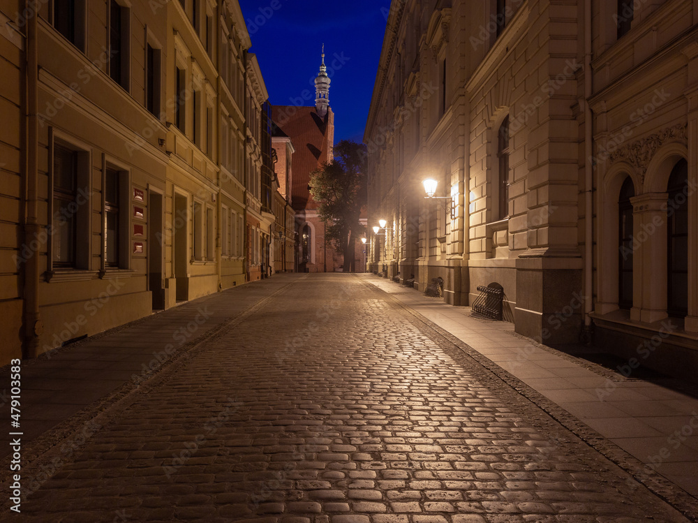 Bydgoszcz. Old houses on in the night illumination.