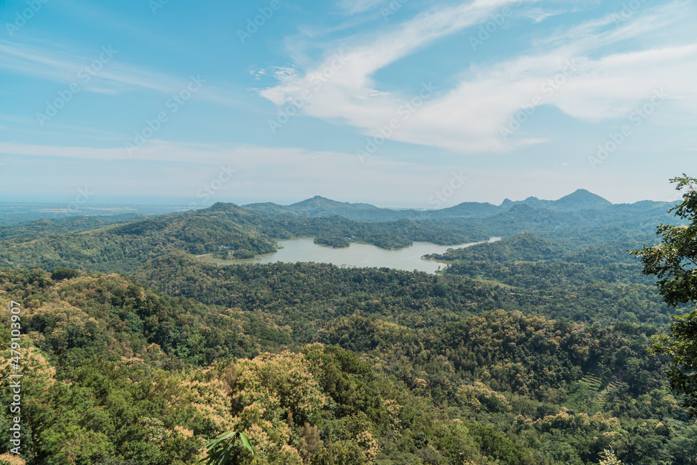 Obraz premium The Amazing Kalibiru tourism, a large reservoir surrounded by lush trees has become one of the popular tourist destinations in Indonesia