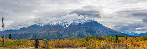 Panoramic view of wilderness scenic landscape in northern Canada, Yukon Territory during fall, autumn. Taken in September. 