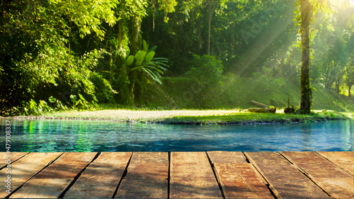 wooden table with beautiful river background and nature