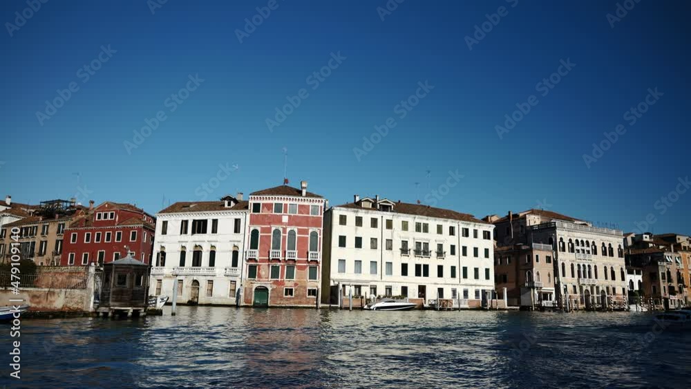 Venice, Italy - January 2022 - Traveling on the public transport boat, along the Grand canal, among the historic buildings of the lagoon city
Venice, Italy - January 2022 - Traveling on the public transport boat, along the Grand canal, among the historic buildings of the lagoon city
