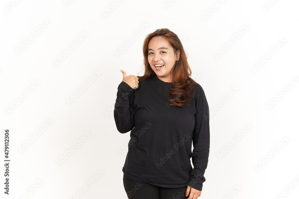 Pointing to Product Using Thumb Of Beautiful Asian Woman Wearing Black Shirt Isolated On White Pointing to Product Using Thumb Of Beautiful Asian Woman Wearing Black Shirt Isolated On White