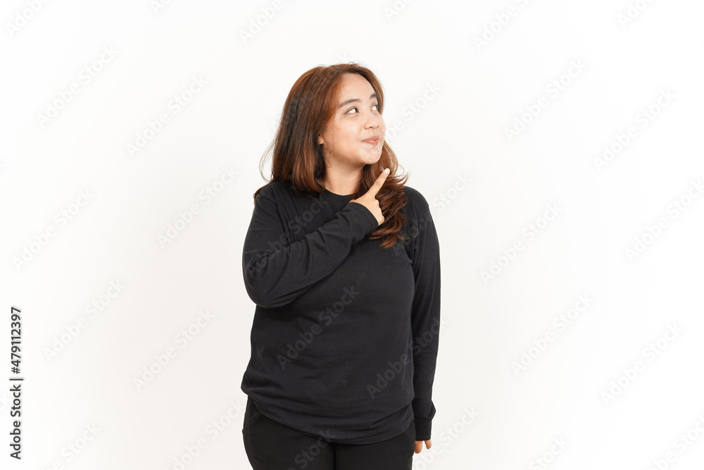 Pointing to product Of Beautiful Asian Woman Wearing Black Shirt Isolated On White Background Pointing to product Of Beautiful Asian Woman Wearing Black Shirt Isolated On White Background