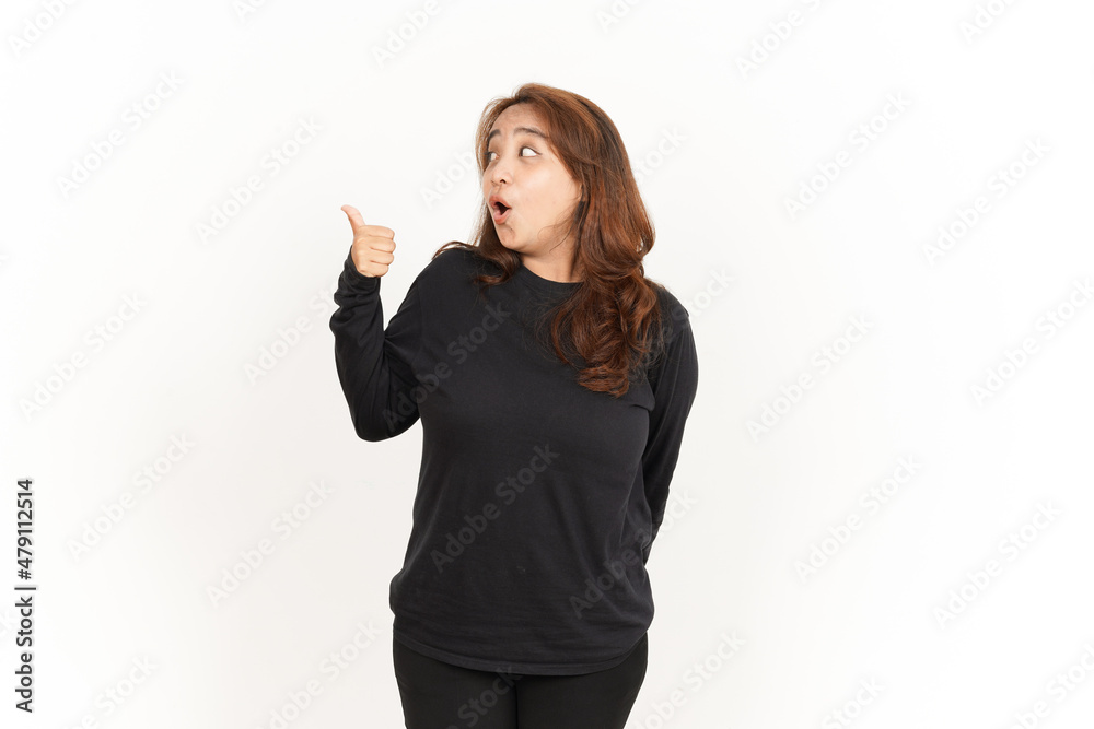 Pointing to Product Using Thumb Of Beautiful Asian Woman Wearing Black Shirt Isolated On White Pointing to Product Using Thumb Of Beautiful Asian Woman Wearing Black Shirt Isolated On White