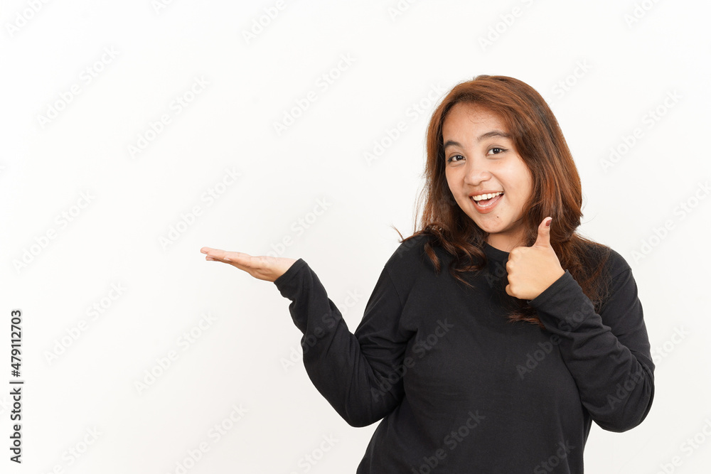 Showing recommended product on open palm Of Beautiful Asian Woman Wearing Black Shirt Showing recommended product on open palm Of Beautiful Asian Woman Wearing Black Shirt