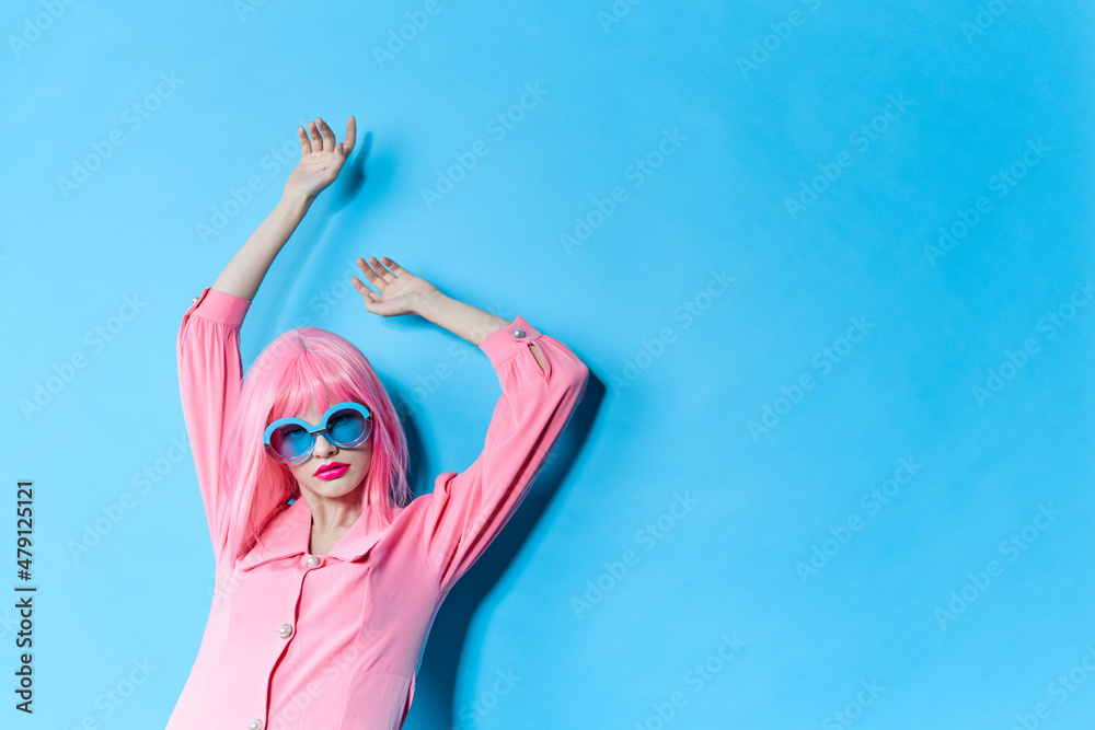 glamorous woman in pink wig pink dress Red lips isolated background
