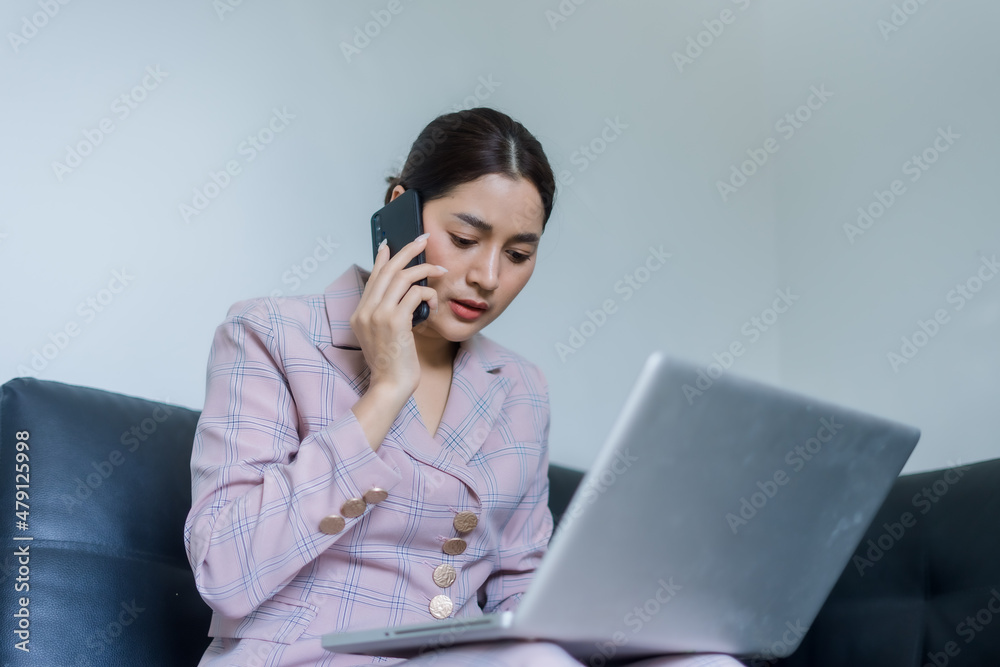 businesswoman talking on the phone in office businesswoman talking on the phone in office