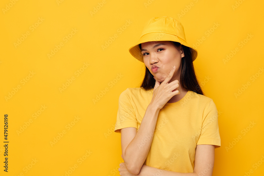 woman with Asian appearance casual wear studio hand gesture studio model unaltered woman with Asian appearance casual wear studio hand gesture studio model unaltered