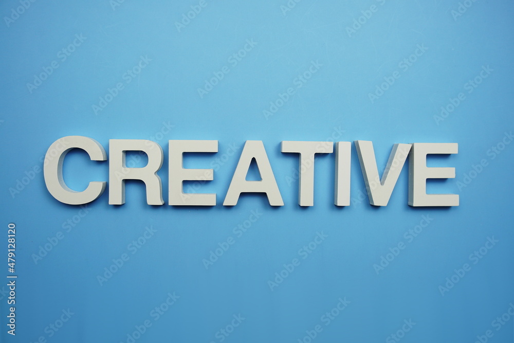 Creative alphabet letters on blue background