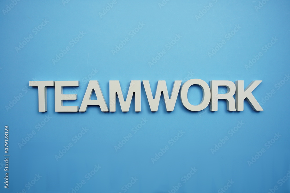 Teamwork alphabet letters on blue background