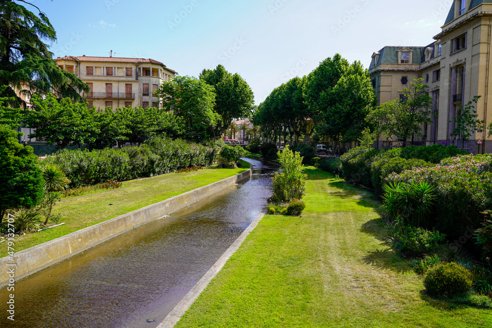 river canal internal to the city of southern france perpignan town