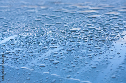 water drops on the roof of a car