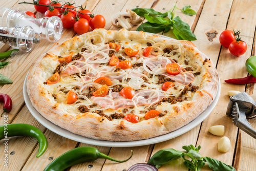 italian pizza on the wooden background
