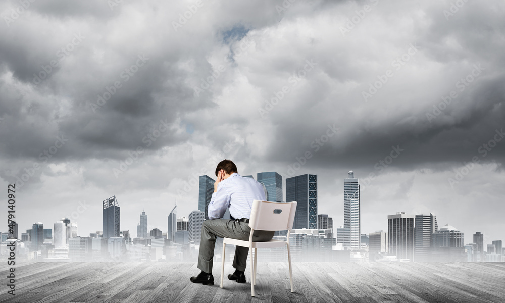 Businessman sitting on an office chair