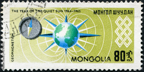 MONGOLIA - CIRCA 1965: stamp printed by Mongolia, shows geomagnetism. International Year of the Sun series