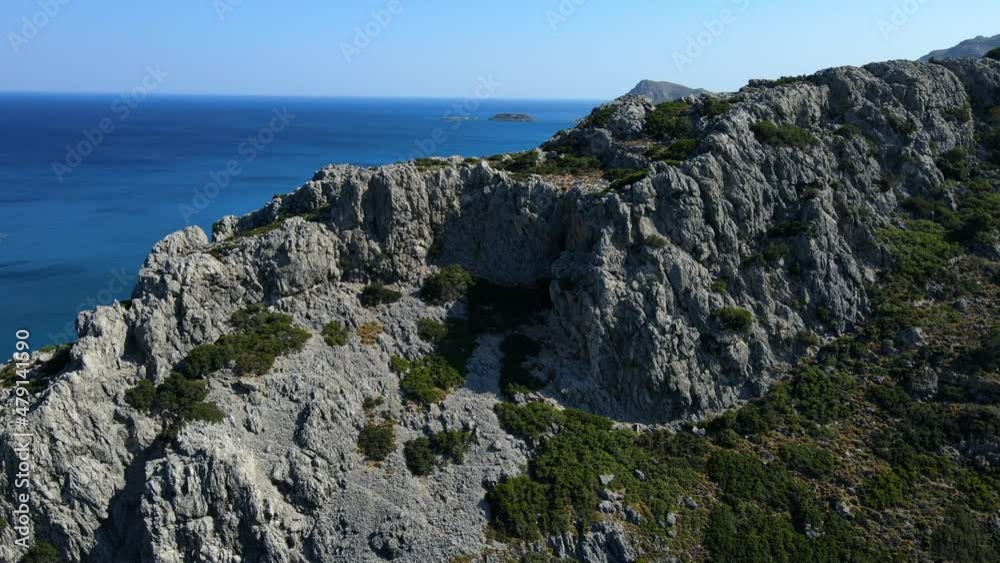 Aerial Downward Scenic Shot Of Plants On Rock Formation At Famous During Sunny Day - Rhodes, Greece Aerial Downward Scenic Shot Of Plants On Rock Formation At Famous During Sunny Day - Rhodes, Greece