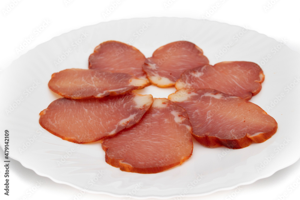 Iberian loin cane. Portion of Iberian loin. The best Spanish sausage, in high demand. Isolated on white background. Iberian loin cane. Portion of Iberian loin. The best Spanish sausage, in high demand. Isolated on white background.