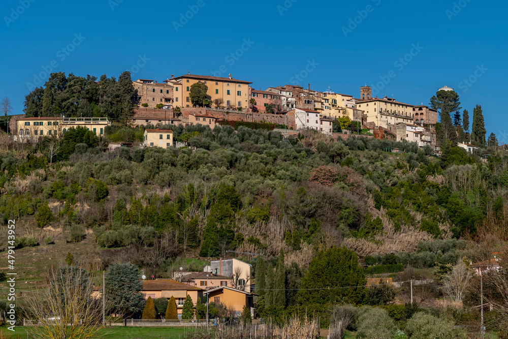 View of the hilltop village of Treggiaia, a hamlet of Pontedera, Italy, on a sunny day