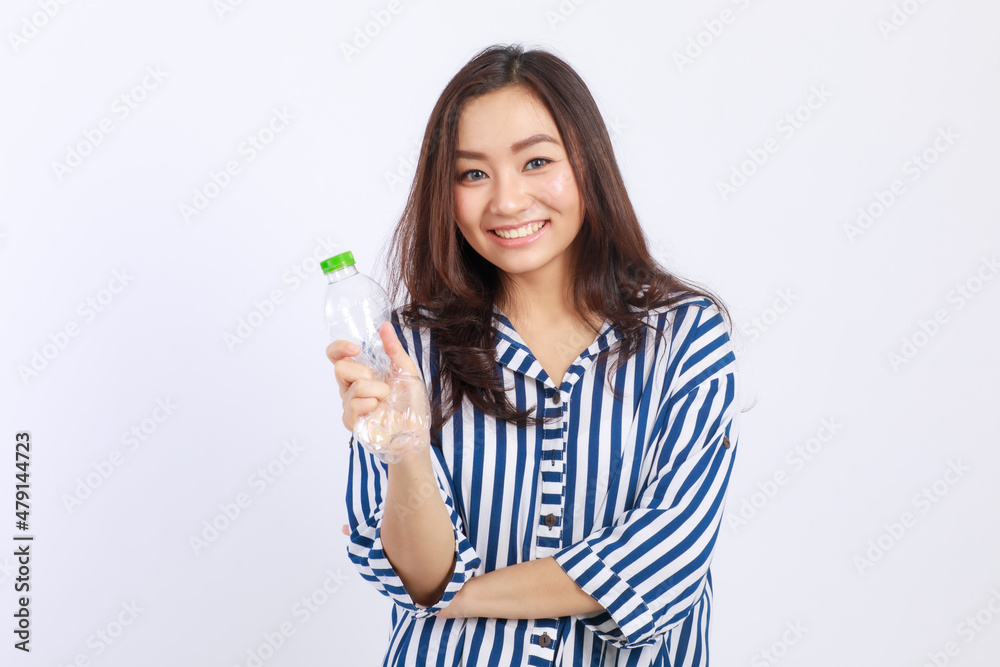 Young, Beautiful Asian woman campaign Say no to plastic, reducing plastic waste, reducing global warming in studio light portrait shot isolated on white background. Environment concept Young, Beautiful Asian woman campaign Say no to plastic, reducing plastic waste, reducing global warming in studio light portrait shot isolated on white background. Environment concept