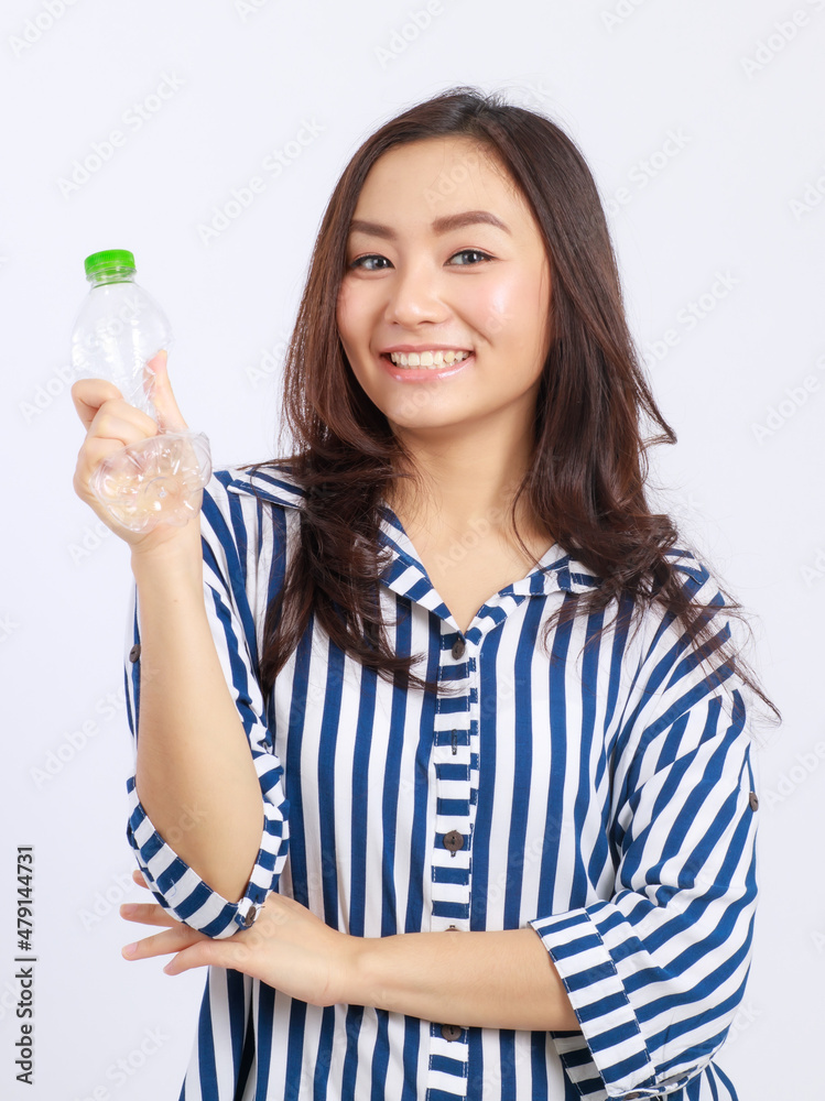 Headshot portrait Asian woman campaign Say no to plastic, reducing plastic waste, reducing global warming in studio light shot isolated on white background. Environment concept Headshot portrait Asian woman campaign Say no to plastic, reducing plastic waste, reducing global warming in studio light shot isolated on white background. Environment concept