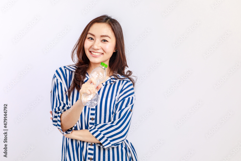 Young, Beautiful Asian woman campaign Say no to plastic, reducing plastic waste, reducing global warming in studio light portrait shot isolated on white background. Environment concept Young, Beautiful Asian woman campaign Say no to plastic, reducing plastic waste, reducing global warming in studio light portrait shot isolated on white background. Environment concept