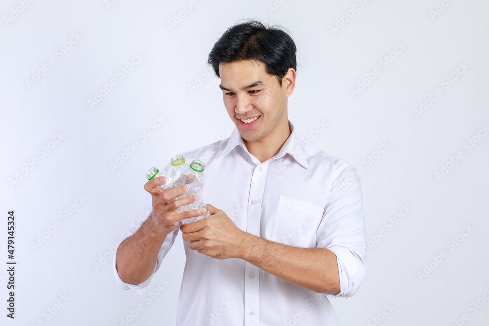 Handsome, friendly face asian man smile happy, dressed casually campaign say no plastic, reducing plastic, reducing global warming, studio light shot isolated on white background. Environment concept Handsome, friendly face asian man smile happy, dressed casually campaign say no plastic, reducing plastic, reducing global warming, studio light shot isolated on white background. Environment concept