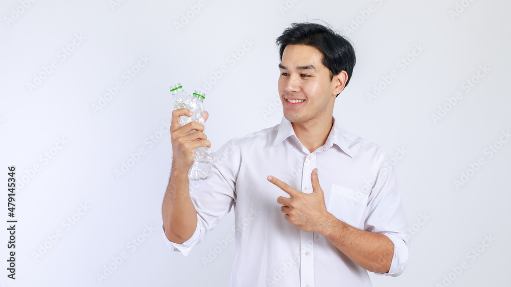 Handsome, friendly face asian man smile happy, dressed casually campaign say no plastic, reducing plastic, reducing global warming, studio light shot isolated on white background. Environment concept Handsome, friendly face asian man smile happy, dressed casually campaign say no plastic, reducing plastic, reducing global warming, studio light shot isolated on white background. Environment concept