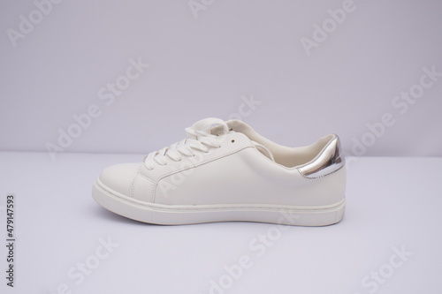 Shoe kept against plain white background