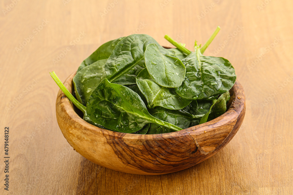 Fresh green spinach leaves in the bowl Fresh green spinach leaves in the bowl