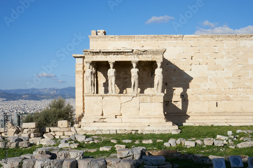 The Erechtheion's south porch, whose roof, instead of being supported on columns, lean on the heads of six statues, the Caryatids.