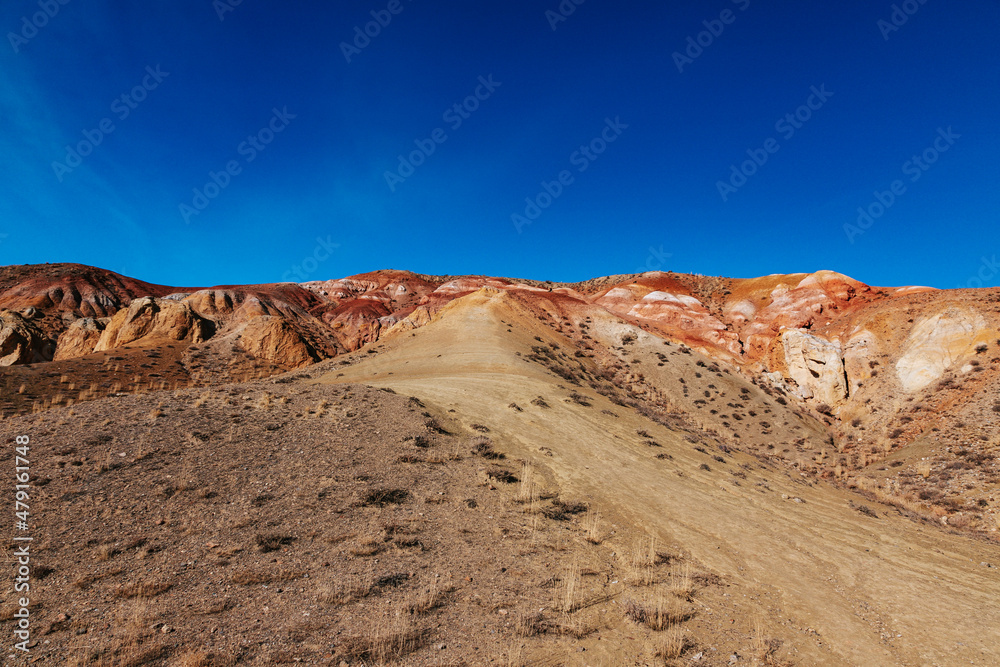 Mountain landscapes with beautiful views of red rocks and peaks in Altai