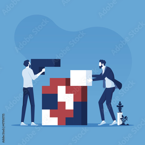 businessman connecting jigsaw blocks elements symbol of teamwork, cooperation, partnership