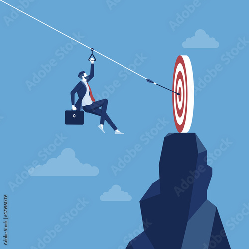 Reach the target, businessman use zipline reaching to the goal, the path to target achievement