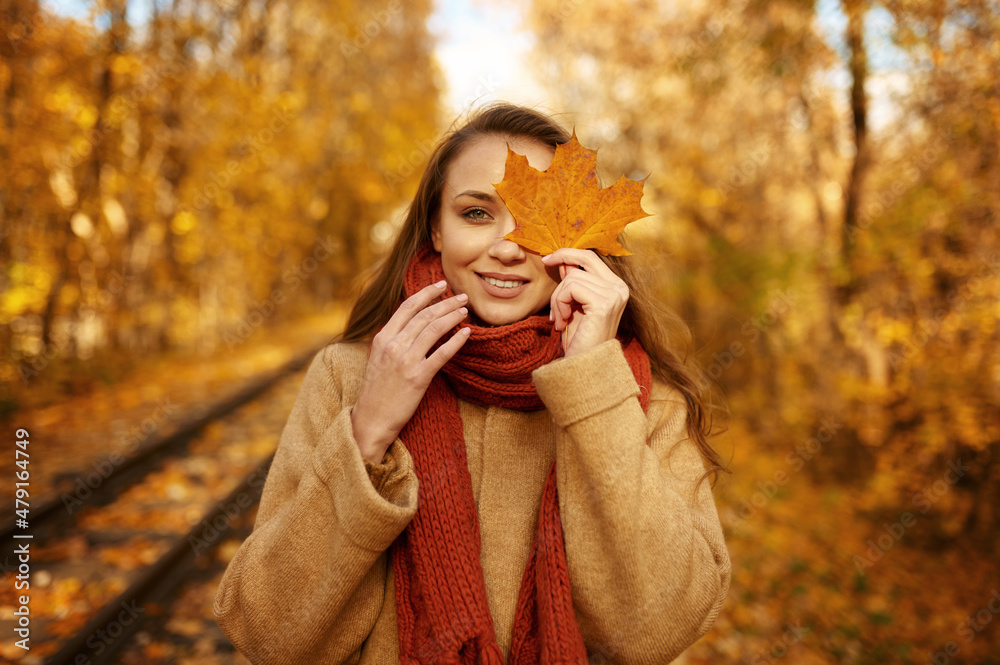 Portrait of woman cover eye with leaf Portrait of woman cover eye with leaf