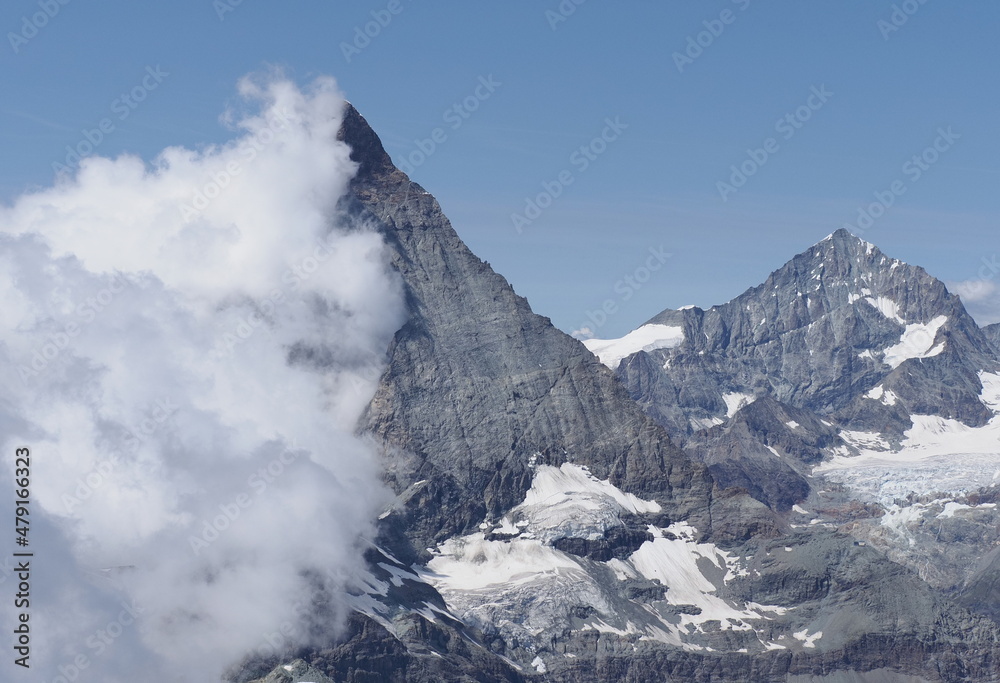 View to Matterhorn, Cervino mountain in clouds in Switzerland