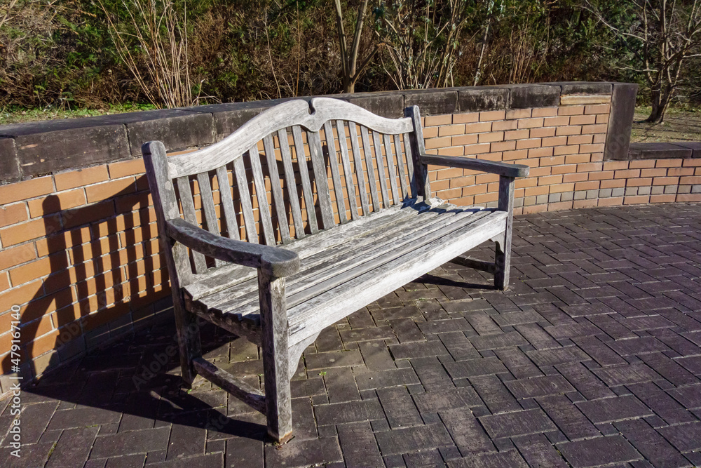 White antique bench in the park