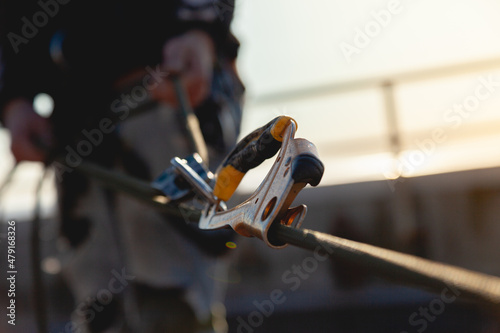Equipment for industrial mountaineering while working on the roof of a building photo