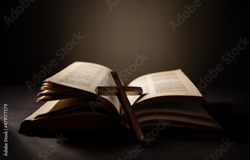 Spirituality, Religion and Hope Concept. Holy Bible and Cross on Desk. Symbol of Humility, Supplication,Believe and Faith for Christian People