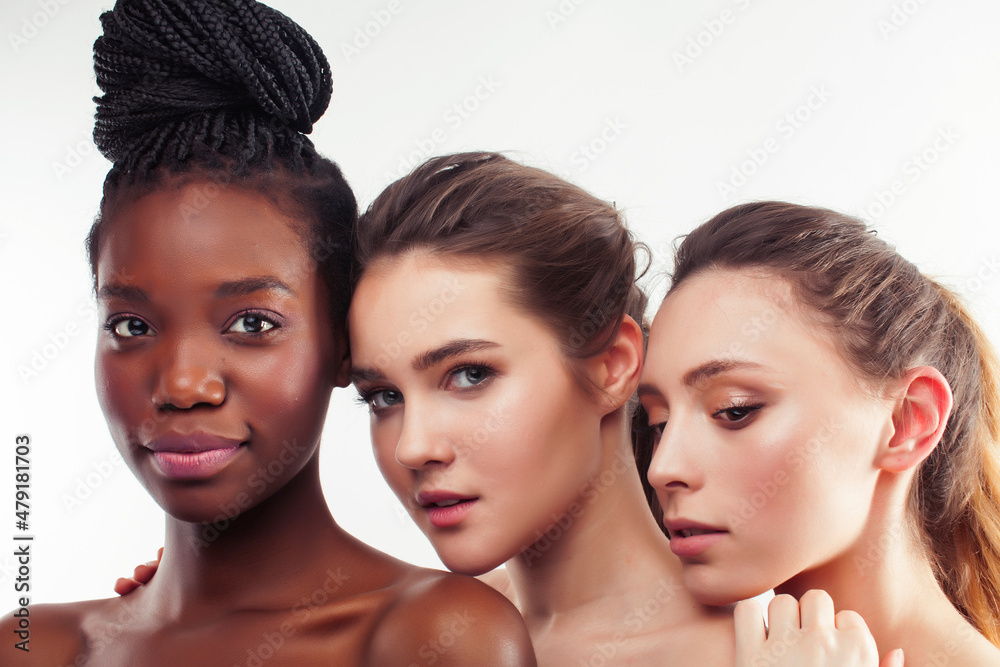 three different nation woman: african-american, caucasian together isolated on white background happy smiling, diverse type on skin, lifestyle real people concept