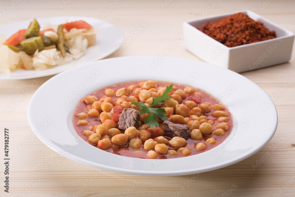 Turkish foods. Chickpea dish prepared on the table. close up Turkish foods. Chickpea dish prepared on the table. close up