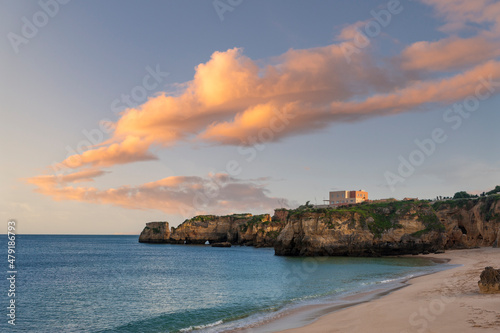 Rocky coast at Praia de Patata beach in Lagos in the Algarve