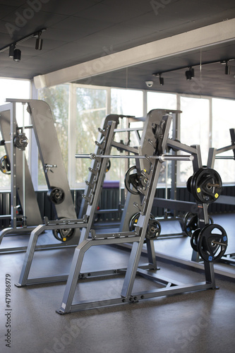Muscle trainers in the gym Stylish room