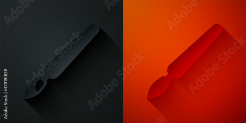 Paper cut Paint brush icon isolated on black and red background. Paper art style. Vector