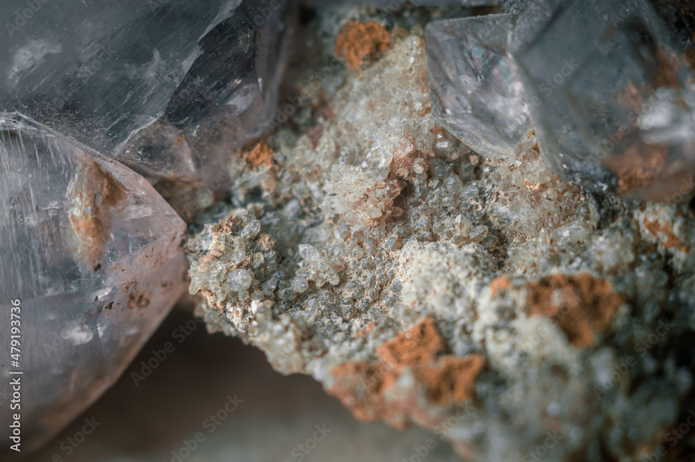 A sample of rock with amethyst under great magnification. Mountain mineral with crystals. Macro, horizontal composition A sample of rock with amethyst under great magnification. Mountain mineral with crystals. Macro, horizontal composition