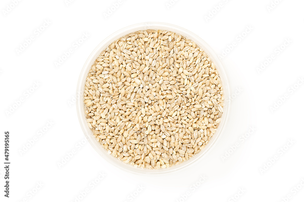 Pearl barley in bowl isolated on white background Pearl barley in bowl isolated on white background