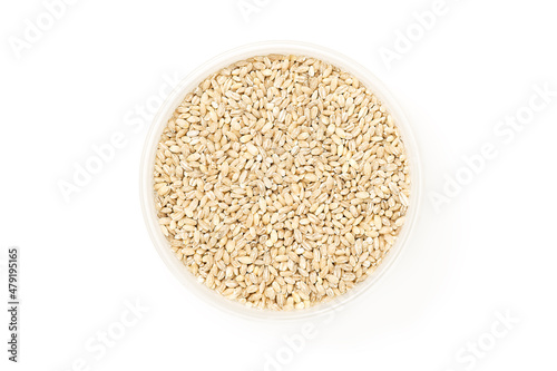 Pearl barley in bowl isolated on white background   