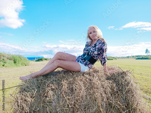 girl on the manger in summer