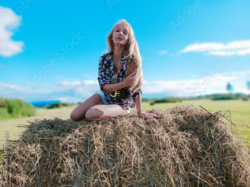girl on the manger in summer