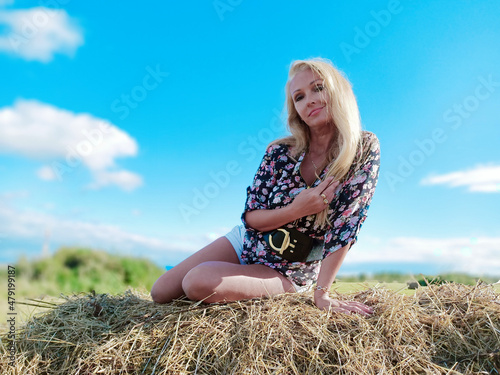 girl on the manger in summer
