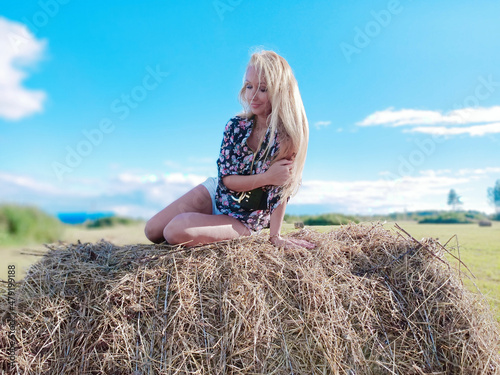 girl on the manger in summer